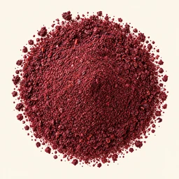 A mound of sumac on a warm cream background.